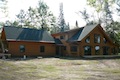 Custom Log Homes Built by Carlton Construction MN.